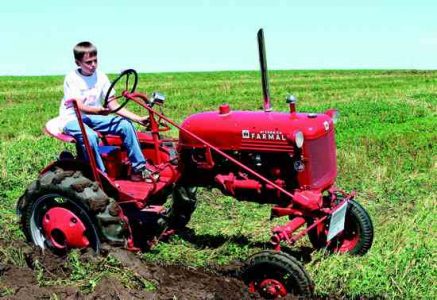 Four Post-World War II Garden Tractors Image